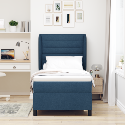 Blaue Boxspring-Bett mit...